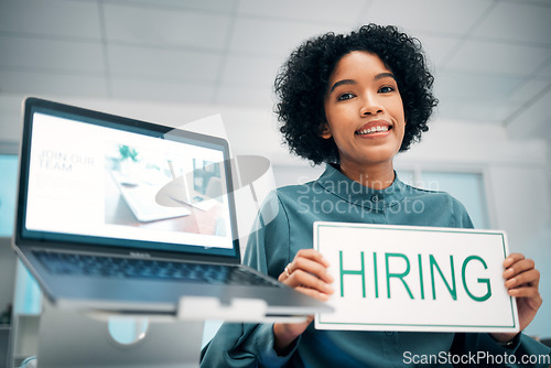 Image of Woman with hiring sign, laptop and human resources with offer, recruitment and job opportunity at company. Onboarding, pc screen with website and HR invitation to join team, poster and recruiting