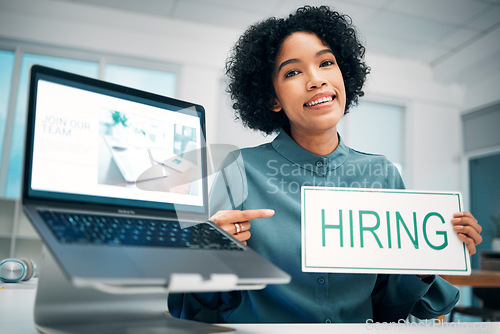 Image of Woman, pointing and hiring sign, laptop and human resources with offer, recruitment and job opportunity. Onboarding, pc screen with website and HR invitation to join team, poster and recruiting