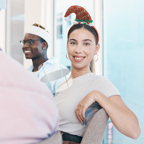 Image of Christmas party, portrait and a woman in the office for an event, celebration or happy. Smile, corporate and a female employee at a festive work social with business people and cheerful with friends