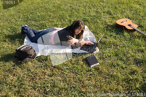 Image of Girl Using a Laptop