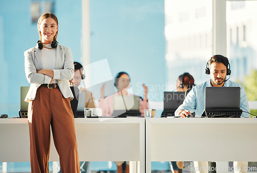 Image of Call center manager, woman and arms crossed in portrait for leadership, telemarketing staff or voip tech. Help desk, computer and customer service team for contact us, technical support or consulting