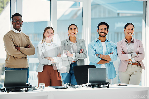 Image of Smile, crossed arms and portrait of business people in the office in collaboration for team building. Happy, diversity and group of professional creative designers with confidence in modern workplace