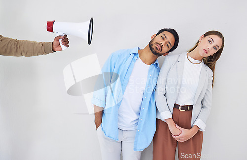 Image of Portrait, megaphone and people at work to listen to a broadcast message on a gray background. Announcement, sound and noise for communication of a news alert or notification with a bullhorn in studio