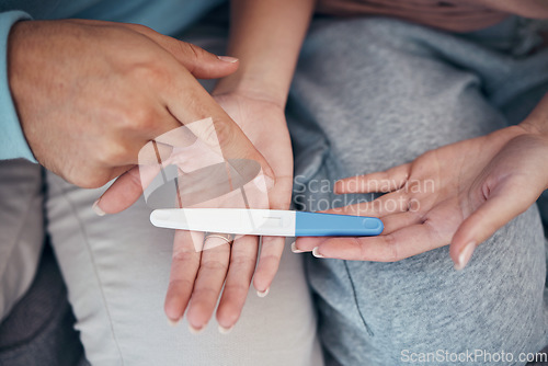 Image of Hands, couple and closeup of pregnancy test, results and waiting for news together in home. Top view, kit and pregnant woman and man family planning for future maternity, ivf fertility and support