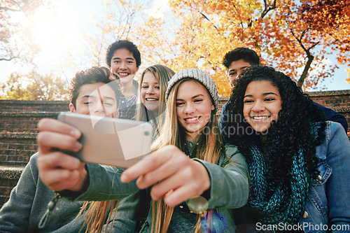 Image of Selfie, vacation or friends in park for social media, online post or profile picture in autumn or nature. Smile, boys or happy gen z girl students taking photograph on fun holiday to relax together