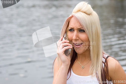 Image of Blonde Girl on the Phone