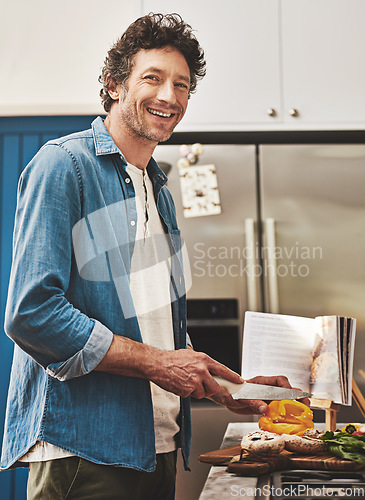 Image of Happy, portrait and man chop vegetables in the kitchen for diet, healthy or nutrition dinner. Smile cooking and mature male person from Canada cutting ingredients for a supper or lunch meal at home.