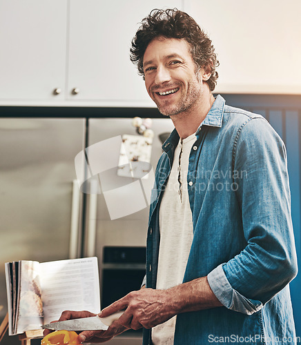 Image of Smile, portrait and man cutting vegetables in the kitchen for diet, healthy or nutrition dinner. Happy, cooking and male person from Canada chop ingredients for a supper or lunch meal at home.