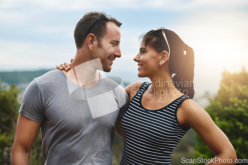 Image of Wellness, love or happy couple hug in park for date, support or care in nature with peace, bond or marriage. Eye contact, romantic man or woman on outdoor holiday vacation together to relax or travel