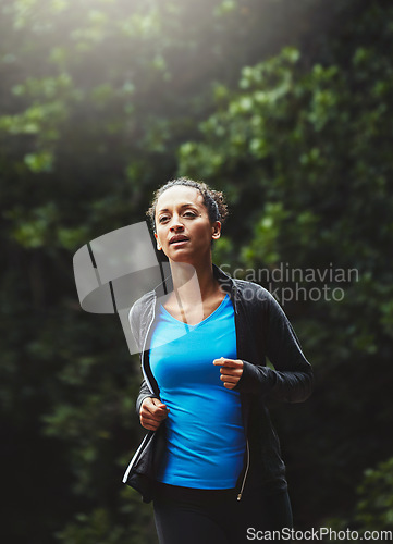 Image of Woman in park, running and fitness in nature, exercise and training for marathon with athlete and sports. Runner, speed and challenge with workout, cardio outdoor for health and wellness with energy