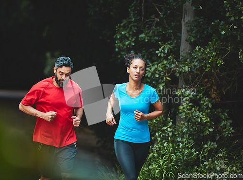 Image of People, running in park for exercise and health outdoor, support and training for marathon with cardio. Runner, athlete and sport with couple in nature, challenge and fitness with workout for race