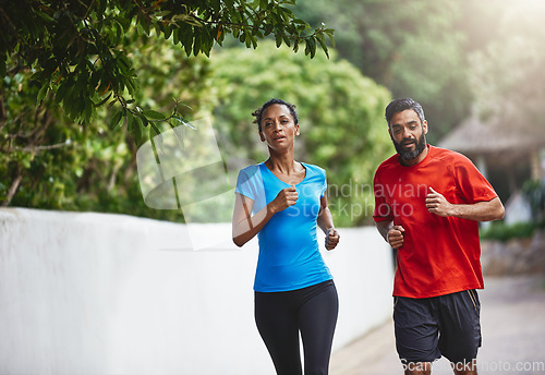 Image of Couple in park, running together and exercise in nature, fitness and training for marathon with bonding and sports. People workout, cardio outdoor for health and wellness with runner and challenge