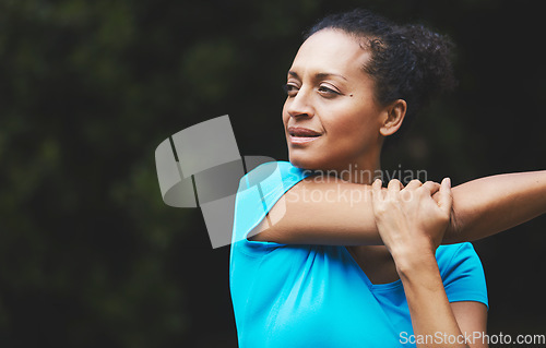 Image of Woman stretching, park and fitness outdoor with arm muscle, strong and start exercise. Athlete, sports and flexible in nature, training and ready for workout, prepare with warm up and mockup space