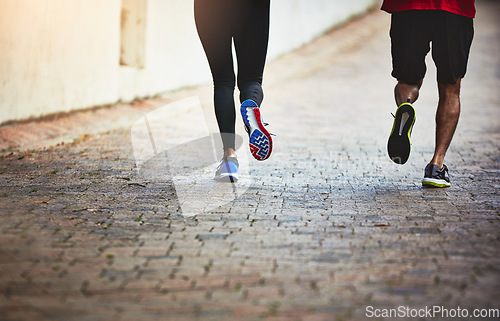 Image of Legs, couple are running together and fitness, exercise and training for marathon with bonding and sports. People workout, cardio on outdoor path for health and wellness with runner and challenge
