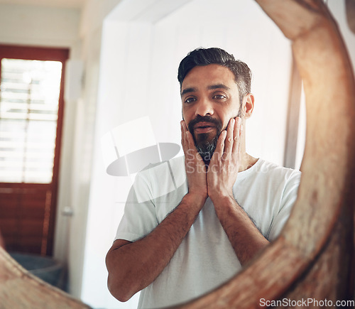 Image of Mature man, mirror and reflection in home with thinking, wellness and beard for skincare, ideas and morning. Person, bathroom and check face for beauty, health and facial hair with routine in house