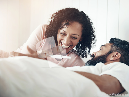 Image of Mature couple, pregnancy test and happy for results, bed or home for celebration, surprise and announcement. Woman, man and excited smile for ivf success, pregnant partner or hope for baby in morning