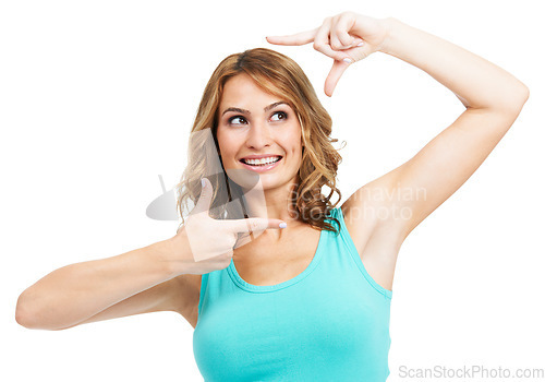 Image of Happy, woman and finger frame in studio to review profile picture on white background. Model, smile and thinking of perspective for photography ideas, planning selfie and hand sign to border face