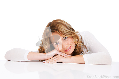 Image of Portrait, woman or laying hands with smile for relax, peace and rest on counter in studio on white background. Person, face or resting on floor with happiness and mock up space for relaxation and joy