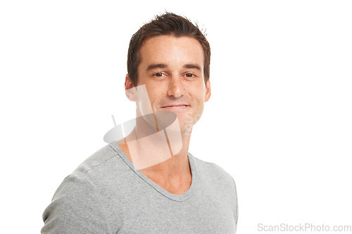 Image of Portrait, happy and a confident man in studio isolated on a white background for fashion or style. Smile, wellness and satisfaction with a young model looking relaxed in a casual clothes outfit