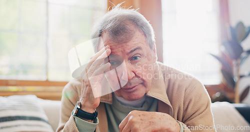 Image of Thinking, stress and senior man on sofa in the living room with memory or reflection face expression. Relax, idea and elderly male person in retirement with dementia disease in lounge of modern home.