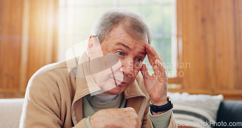 Image of Thinking, stress and senior man on sofa in the living room with memory or reflection face expression. Relax, idea and elderly male person in retirement with dementia disease in lounge of modern home.