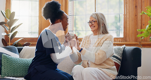 Image of Senior patient, funny or happy caregiver talking for healthcare support at nursing home clinic. Smile, women laughing or nurse speaking of joke to a mature person or woman in a friendly conversation