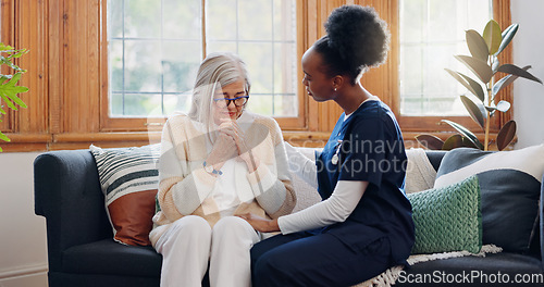 Image of Mature, sad woman or caregiver with empathy or results in consultation for bad news or cancer disease. Stress, depression or nurse with a crying senior patient for support, sympathy or help in home