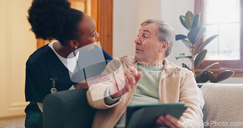 Image of Tablet, nurse and senior man on sofa browsing on internet for medical consultation research. Bonding, healthcare and black woman caregiver talking to elderly patient networking on technology at home.