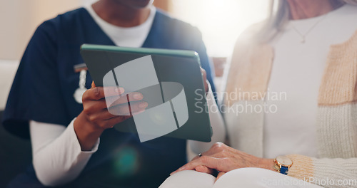 Image of Senior, woman and nurse with tablet for consulting, medical information and health communication on sofa. Elderly, professional and caregiver with touchscreen for online report, advisory and results