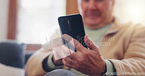 Image of Smartphone and hands of senior man typing online on internet search in retirement home. Phone, elderly person ecommerce and scroll on health website, communication or social media