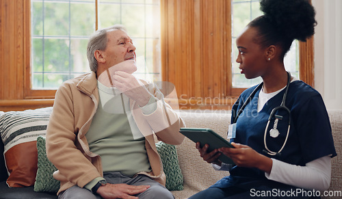 Image of Healthcare, tablet and a senior man with a caregiver during a home visit for medical checkup in retirement. Technology, medicine and appointment with a nurse talking to an elderly patient on the sofa