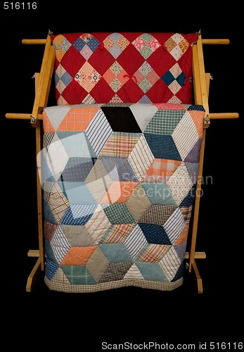 Image of Two Quilts On A Rack