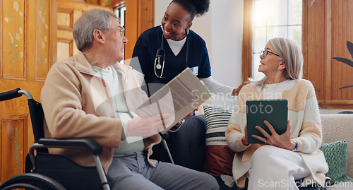 Image of Elderly care, nurse and talking in home with people reading newspaper, book or tablet with discussion of support. Retirement, caregiver and relax in conversation house or living room with notebook