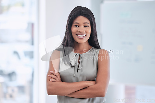 Image of Business, portrait and black woman, arms crossed in office and ready for work. Motivation, goals and vision of corporate female ceo, happy manager or company leader from Nigeria with success mindset