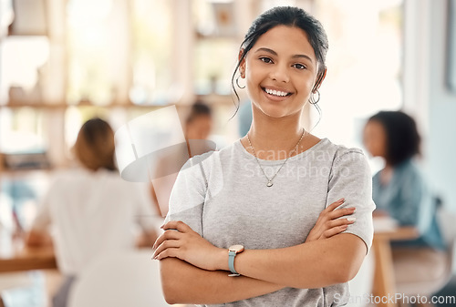 Image of Business woman, designer and portrait of happy employee working, arms crossed and marketing agency, startup and creative company. Smile, happiness and young employee internship at advertising agency