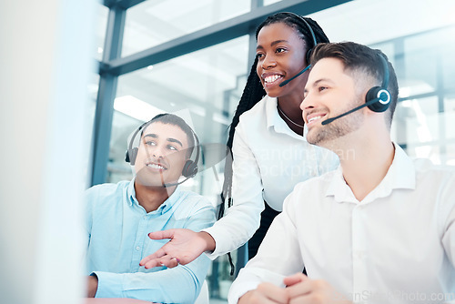 Image of Call center, team and coaching mentor for telemarketing, customer service or sales at the office. Happy employee agents in teamwork, contact us or help for consulting or online desktop support