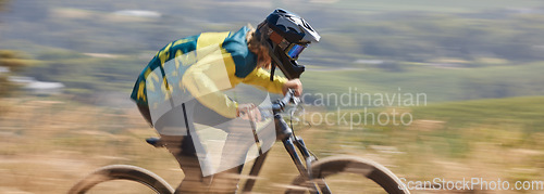 Image of Bike, fitness and man cycling with speed on a sports bicycle for cardio exercise, workout and training for a race. Action, biker and healthy athlete riding fast in nature outdoors in summer in Texas