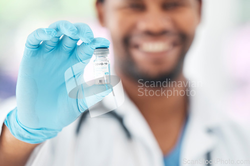 Image of Doctor, hands and covid sample or vaccine in healthcare, medical or science research at hospital. Hand of GP professional holding vial test, medicine or cure for disease, illness or virus at clinic