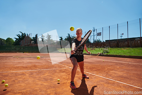 Image of A young girl showing professional tennis skills in a competitive match on a sunny day, surrounded by the modern aesthetics of a tennis court.