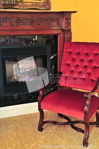 Image of Fireplace and red chair