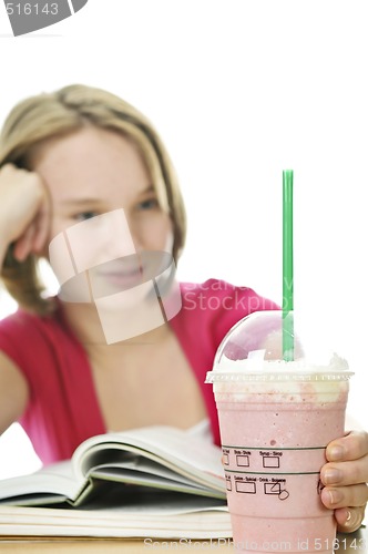 Image of Teenage girl with milkshake