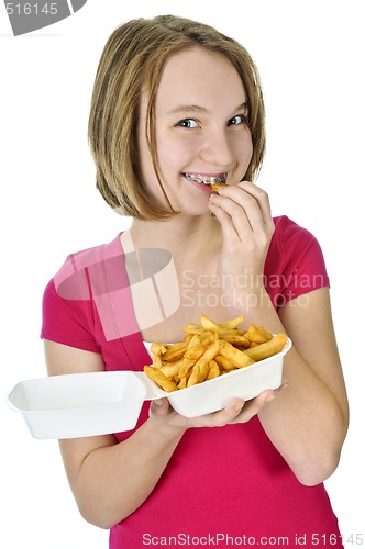 Image of Teenage girl with french fries