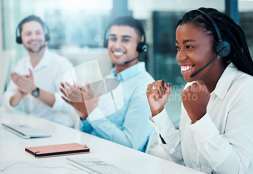 Image of Black woman, fist or success in call center celebration, contact us growth or telemarketing target in teamwork collaboration. Smile, happy or winner customer support workers in office crm sales goals