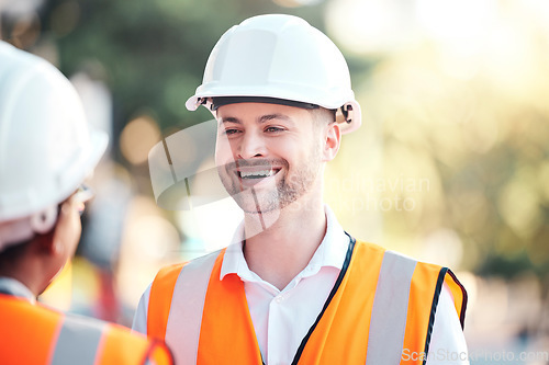 Image of Safety, architecture and happy engineer at a construction site talking or speaking at a home renovation. Smile, contractor and engineering partner in conversation at an outdoor building project job