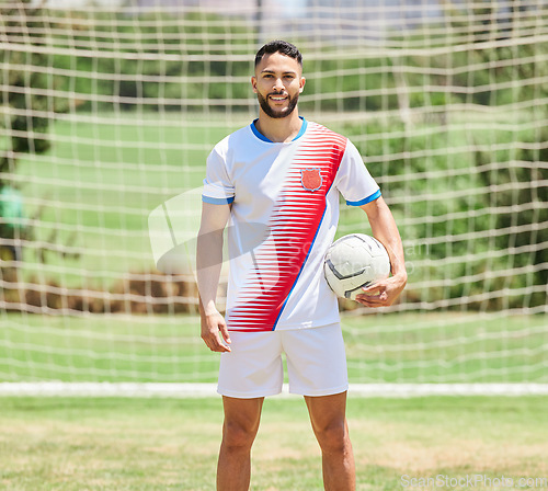 Image of Fitness, sports and soccer player portrait on a football field ready to play a soccer match or training game. Healthy, smile and happy athlete on a grass pitch for a cardio exercise and workout