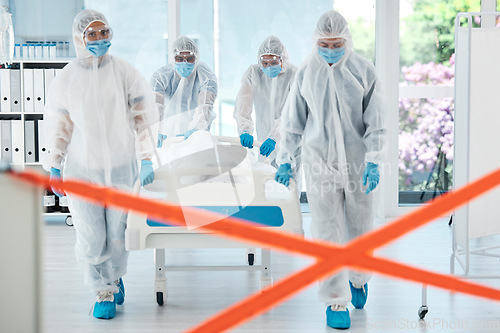 Image of Healthcare doctor, covid patient or quarantine red tape zone with team in hazmat suit for bacteria, sick or dead person in hospital. Medical PPE covid 19 nurse, virus or corona virus safety protocol