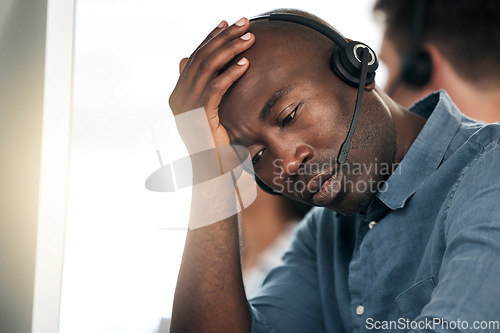 Image of Call center, stress and black man sad about telemarketing depression, problem or work in a crm office. Ecommerce, consulting and African customer service worker thinking of a problem online in sales