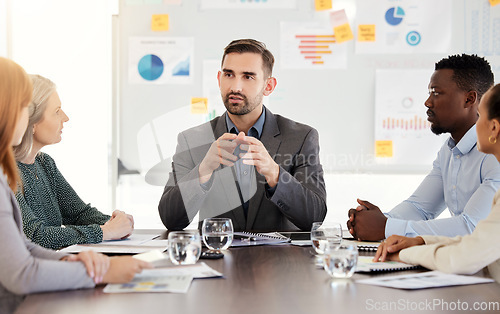 Image of Business meeting, finance strategy and corporate man speaker with an office team talking and planning. Teamwork, working and company communication of a discussion about financial data and information