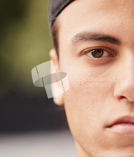 Image of Half, side and face of a man with focus, motivation and commitment for basketball in the city. Training, sports and facial portrait of an athlete serious about sport, fitness and mockup on court