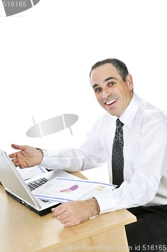 Image of Businessman at his desk on white background